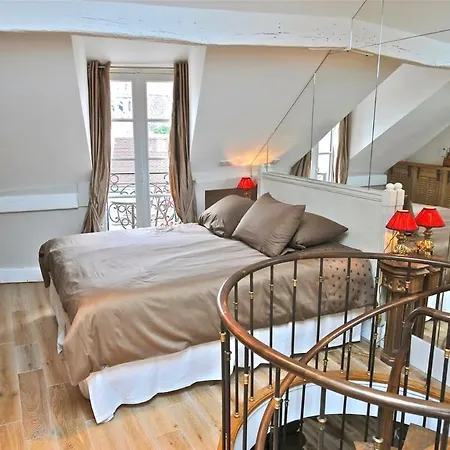 A Balcony On Notre Dame Apartment Paris
